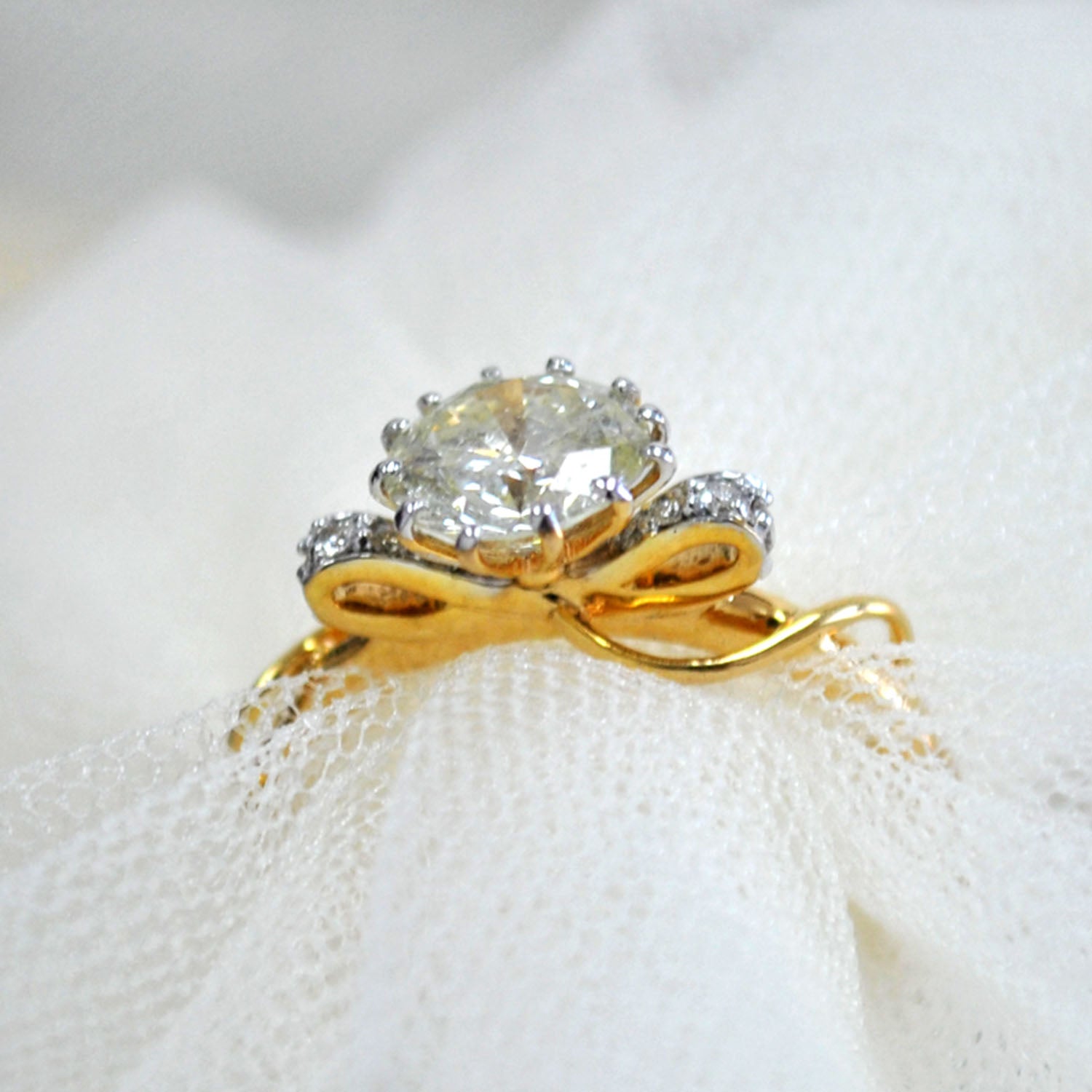 One carat Certified Solitaire Ring, 14K Gold Bow with accent Diamonds