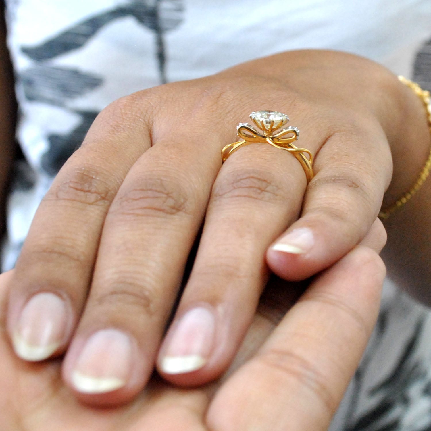 One carat Certified Solitaire Ring, 14K Gold Bow with accent Diamonds