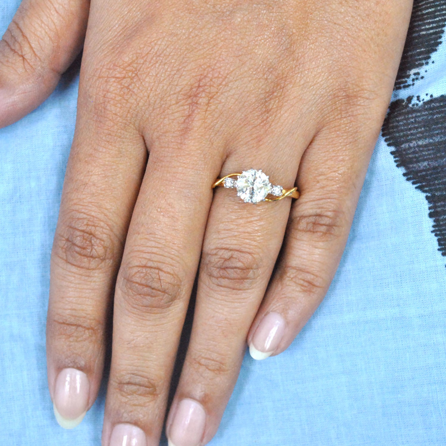 One carat Certified Solitaire Ring, 14K Gold Bow with accent Diamonds