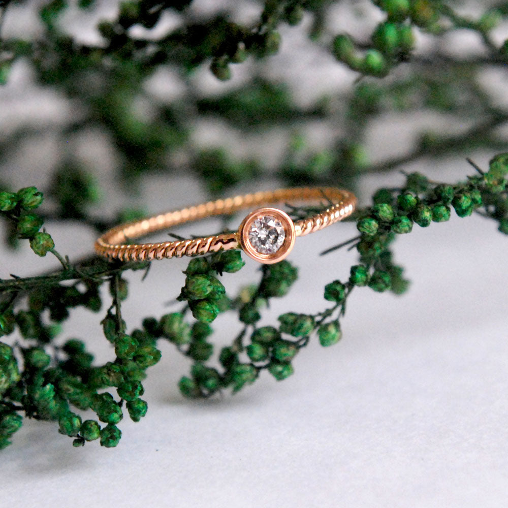 Bezel Set Small Round Diamond Ring with  Minimal twisted Wire Rope Band