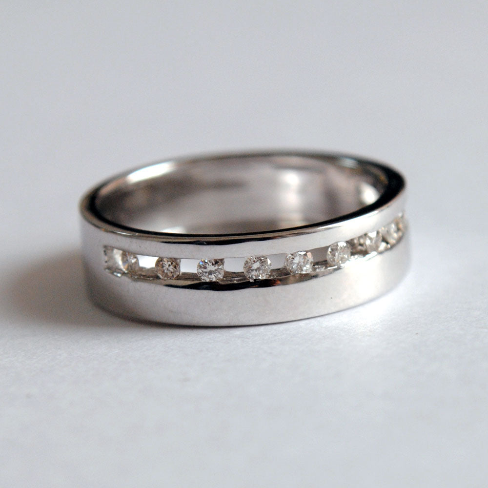 Broad Channel Set Diamond Wedding Band For Men