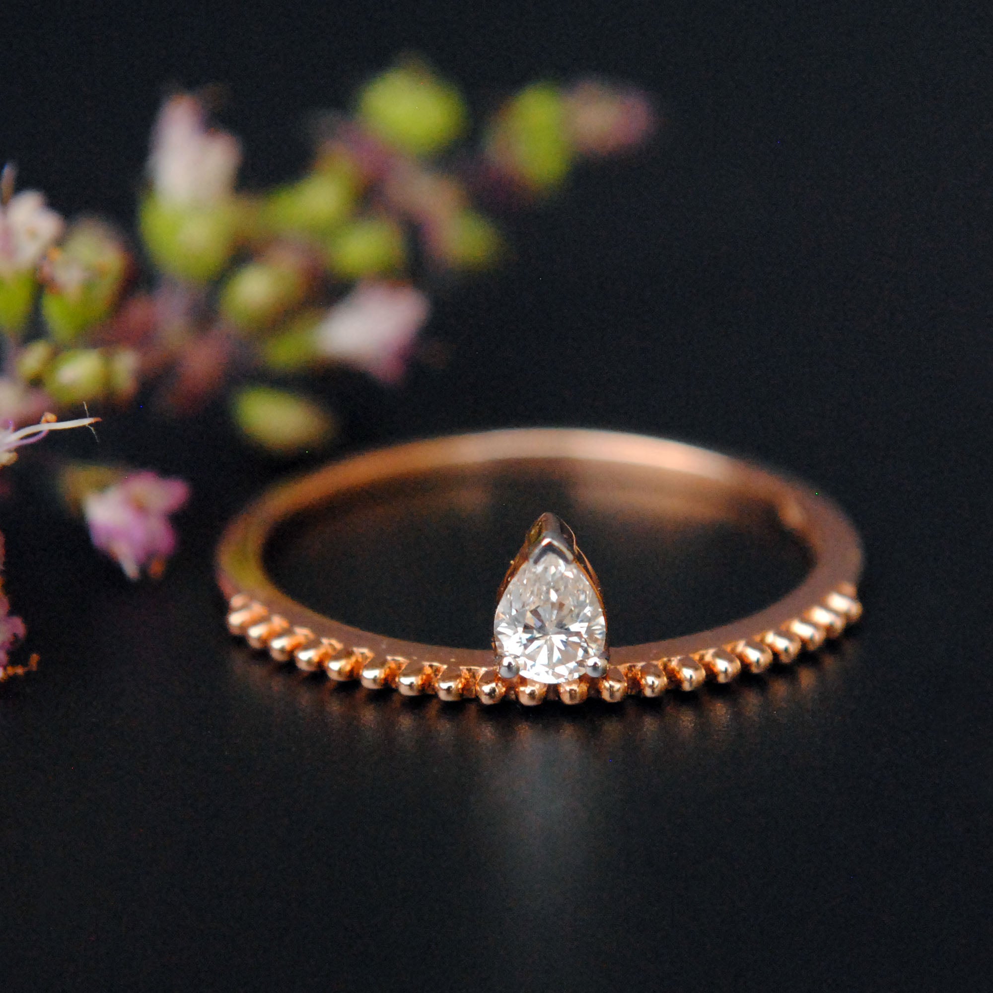 Off Centre Pear Diamond Ring with Milligrain Band