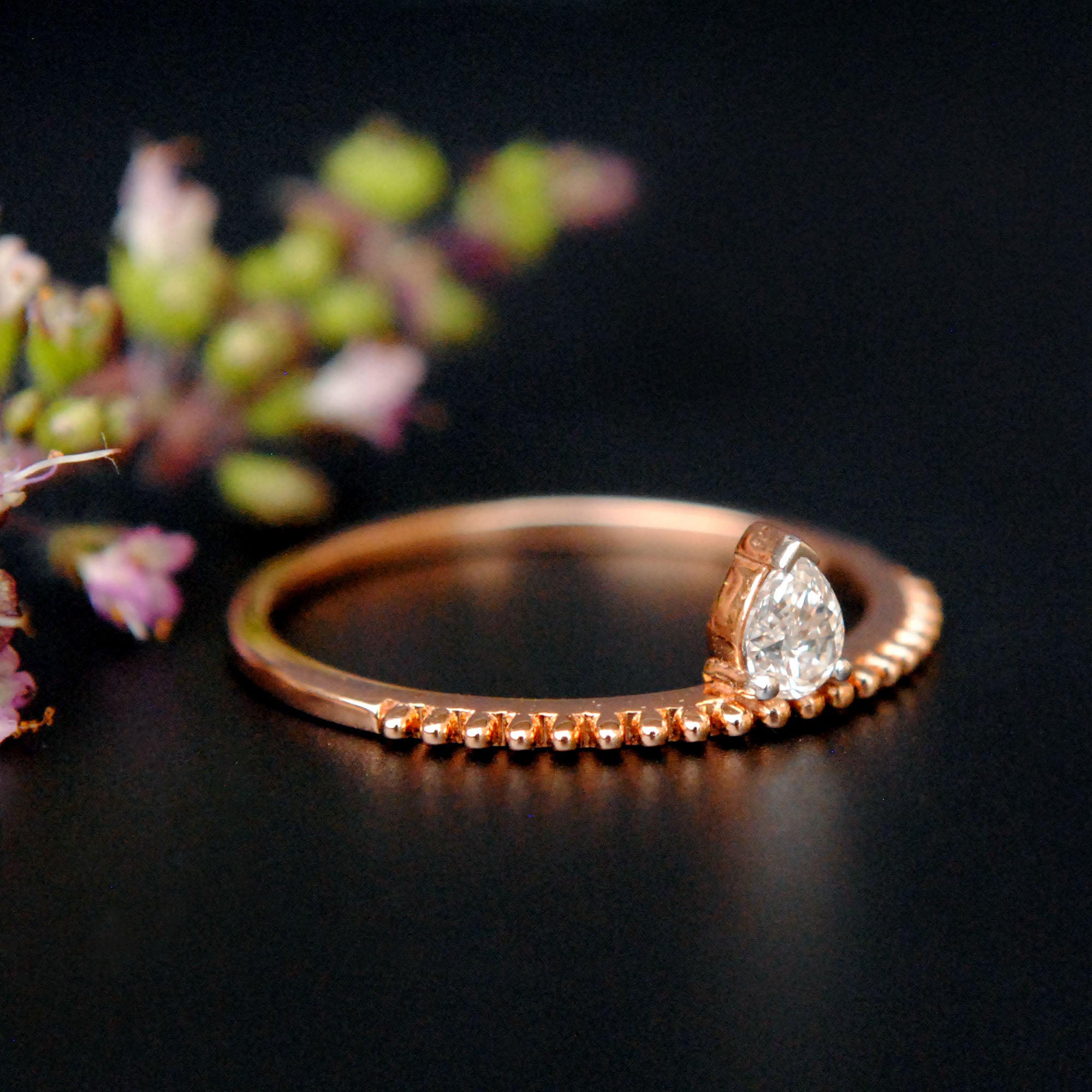 Off Centre Pear Diamond Ring with Milligrain Band