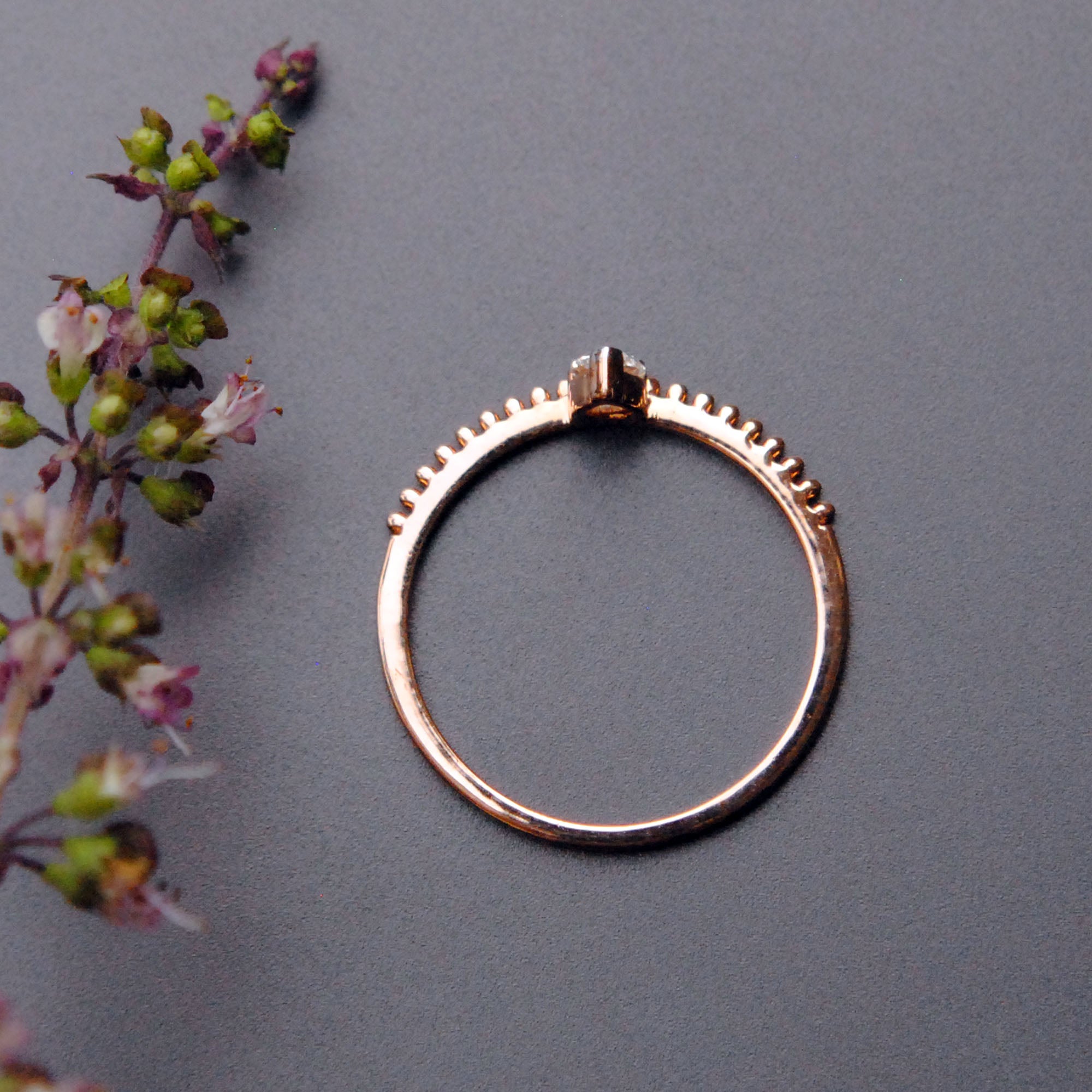 Off Centre Pear Diamond Ring with Milligrain Band