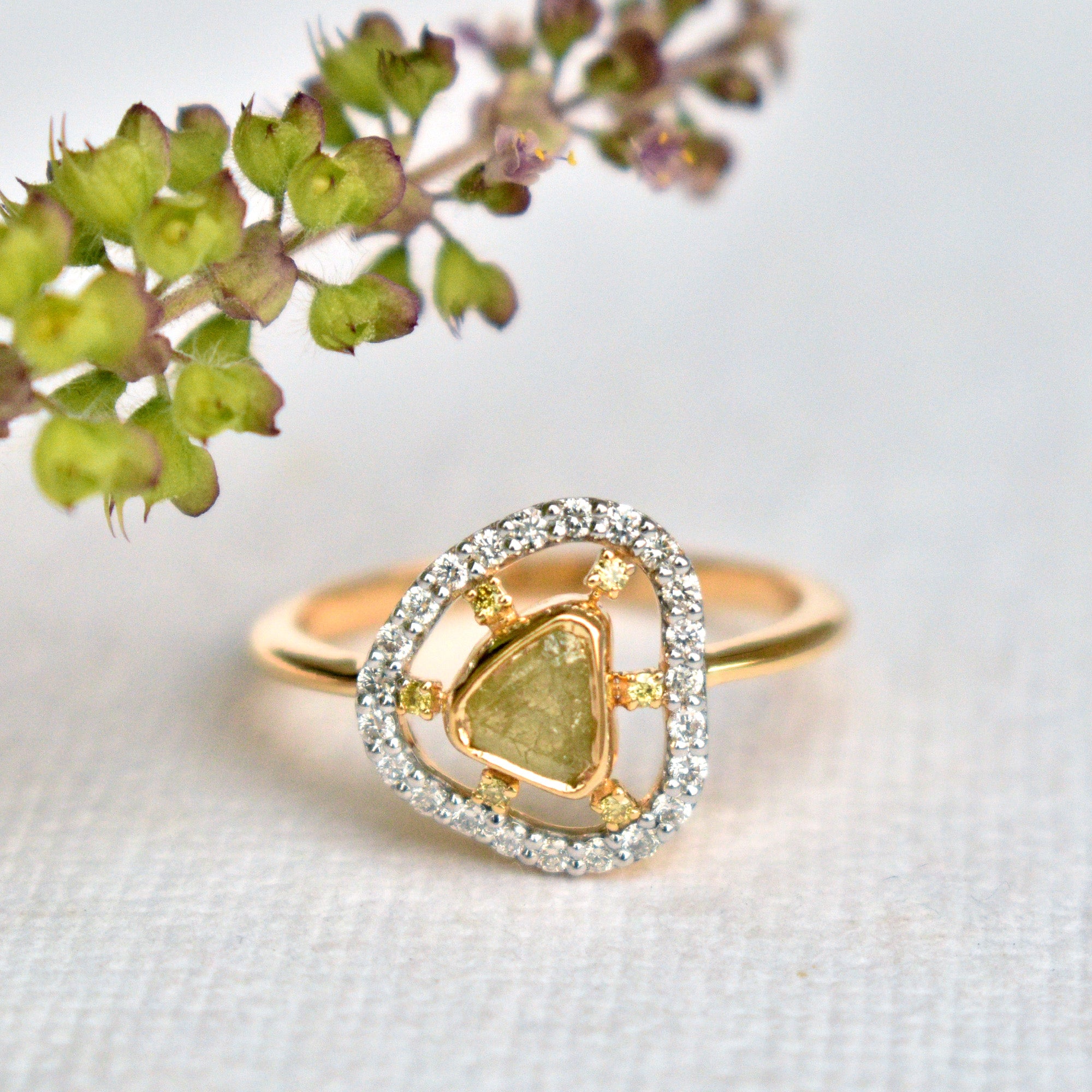 Half Carat Natural Yellow Raw Diamond with Spaced out Diamond Halo