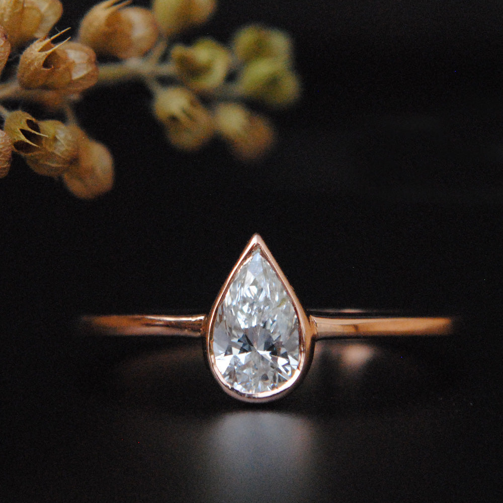 Half Carat Bezel Set Pear Diamond Ring