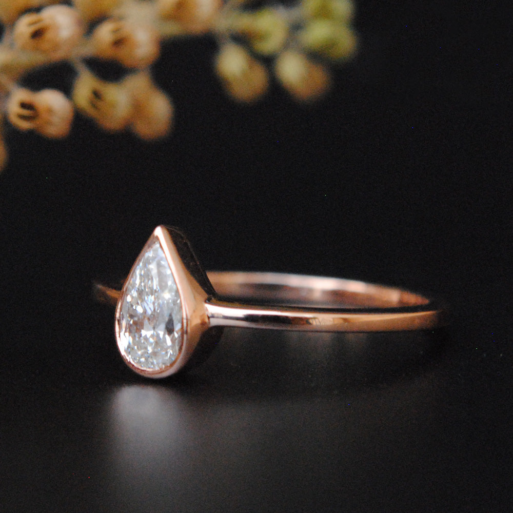 Half Carat Bezel Set Pear Diamond Ring
