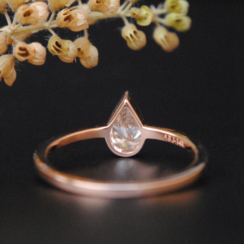 Half Carat Bezel Set Pear Diamond Ring