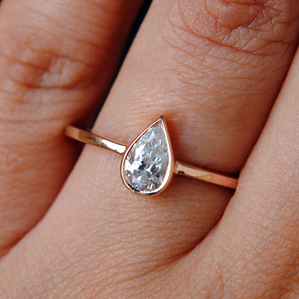 Half Carat Bezel Set Pear Diamond Ring