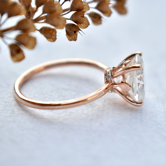 Oval Moissanite Engagement Ring with Fleur De Lis Head with Hidden Natural Diamond UnderHalo