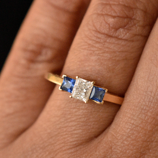 Princess Diamond Three Stone Ring with Blue Sapphire