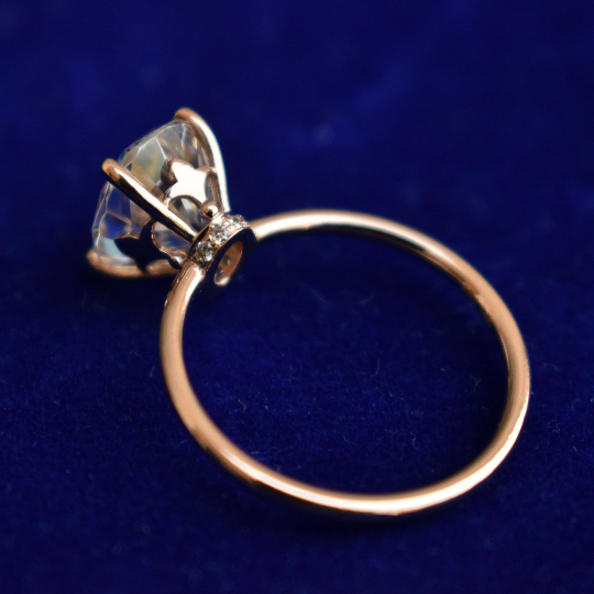 Oval Moissanite Engagement Ring with Fleur De Lis Head with Hidden Natural Diamond UnderHalo