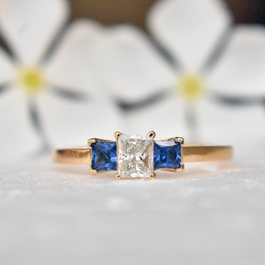 Princess Diamond Three Stone Ring with Blue Sapphire