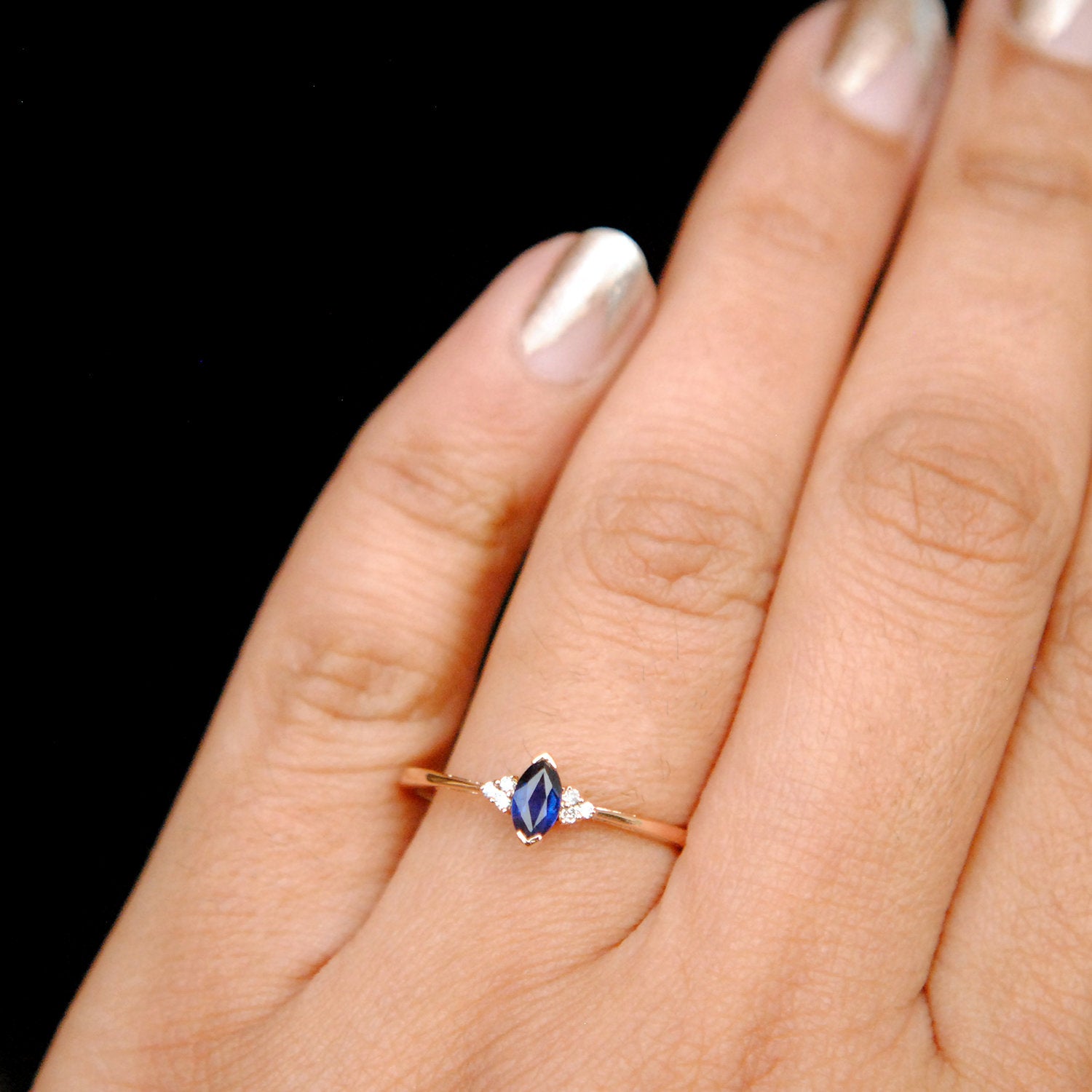 Blue Sapphire Marquise and Diamond Cluster Ring