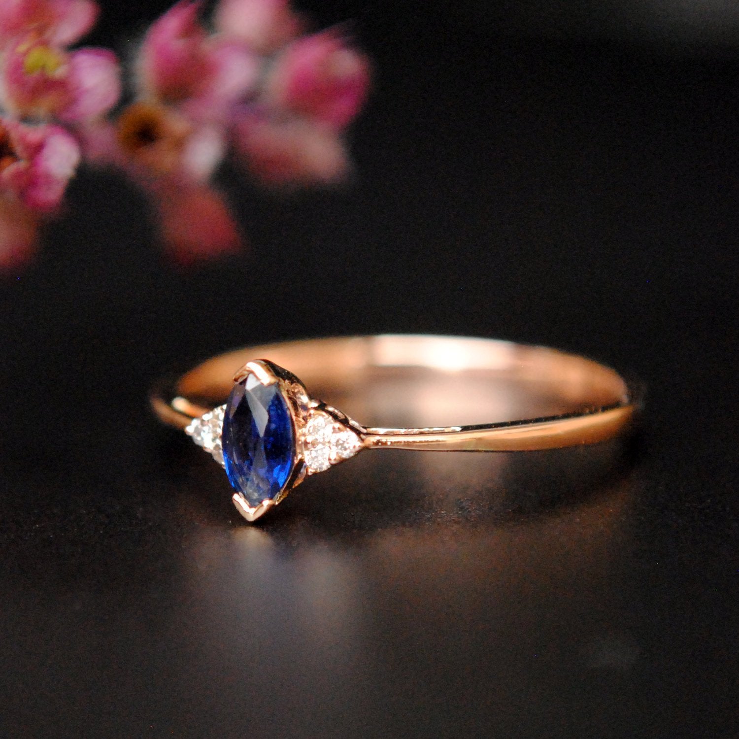 Blue Sapphire Marquise and Diamond Cluster Ring