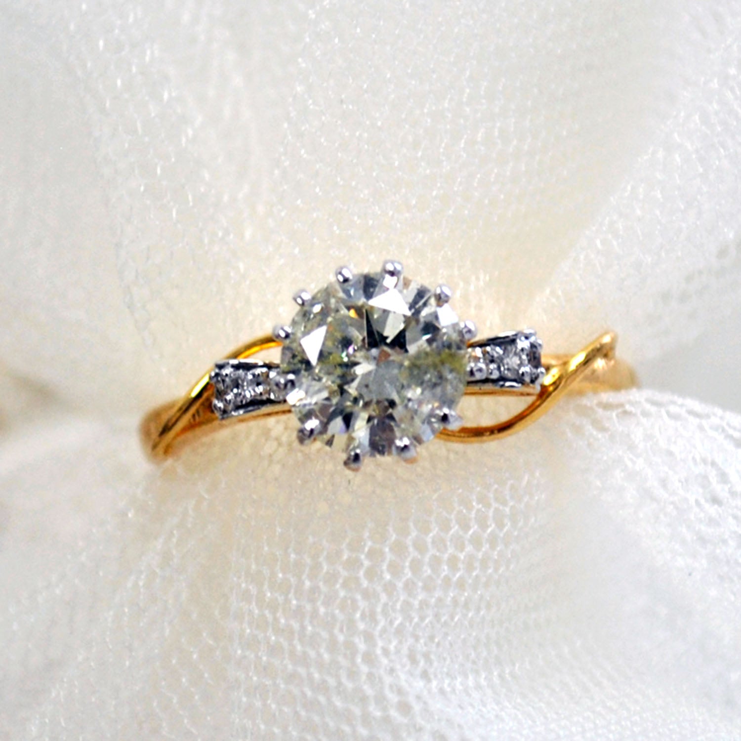 One carat Certified Solitaire Ring, 14K Gold Bow with accent Diamonds