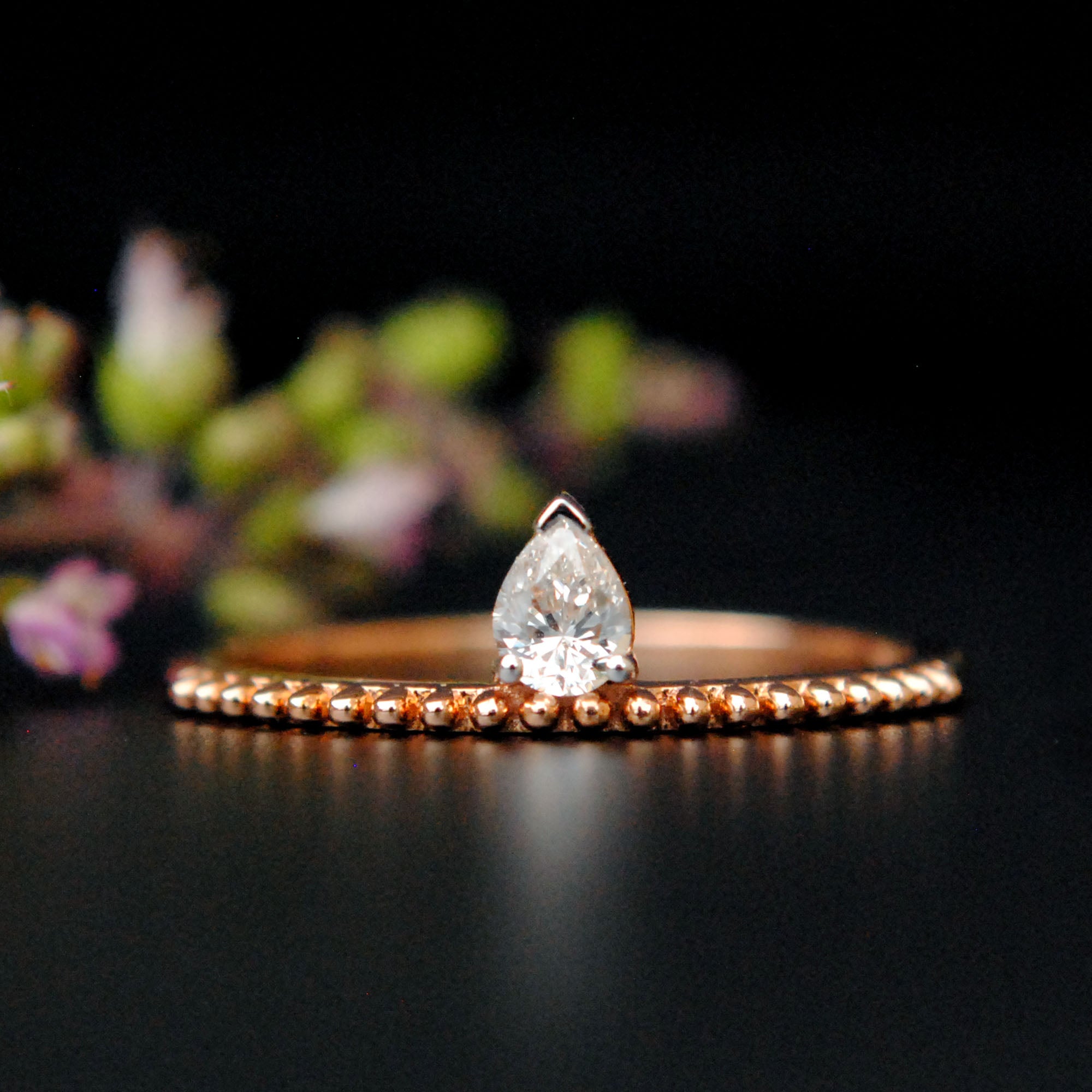 Off Centre Pear Diamond Ring with Milligrain Band