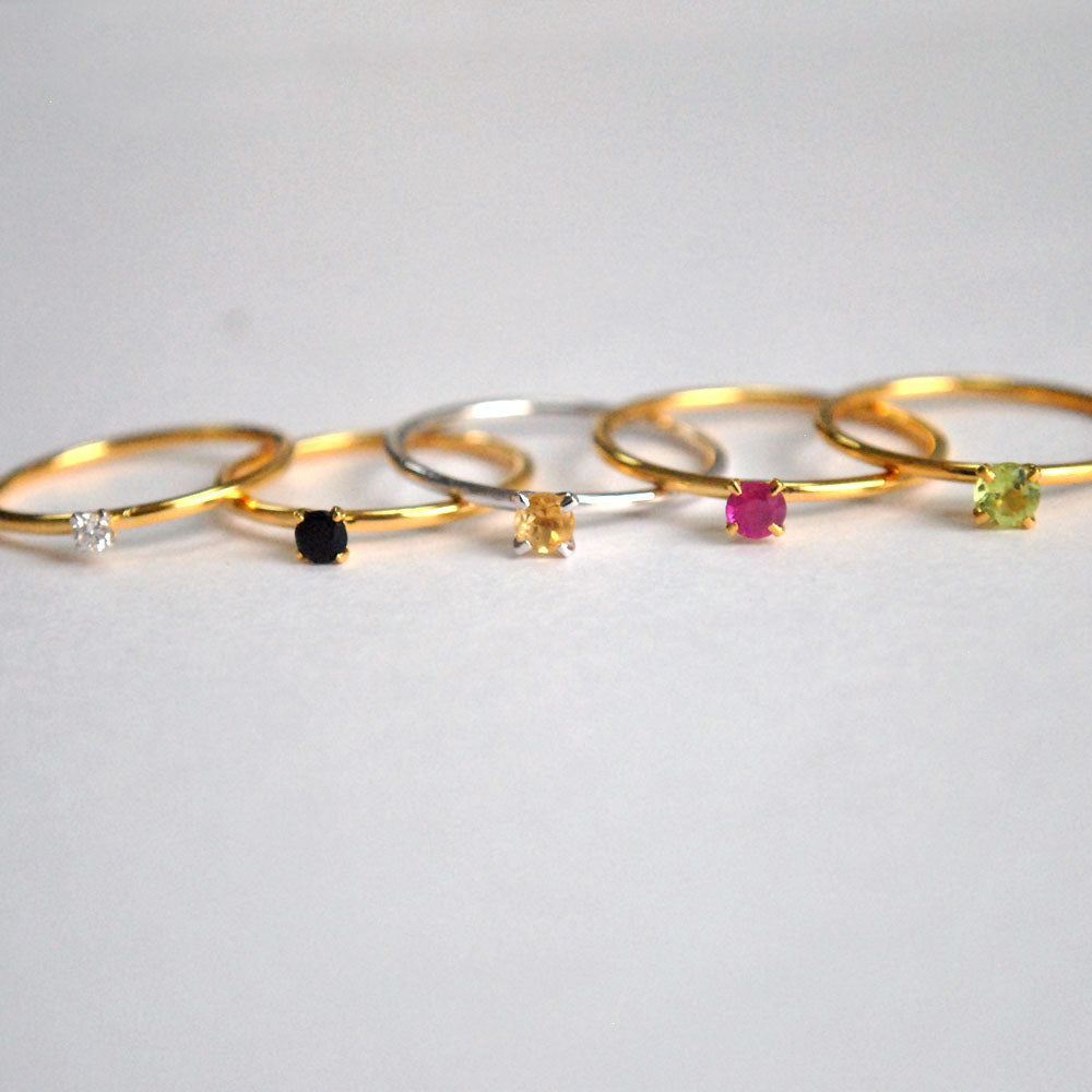 Petite Minimal Gemstone Ring with a Simple Band