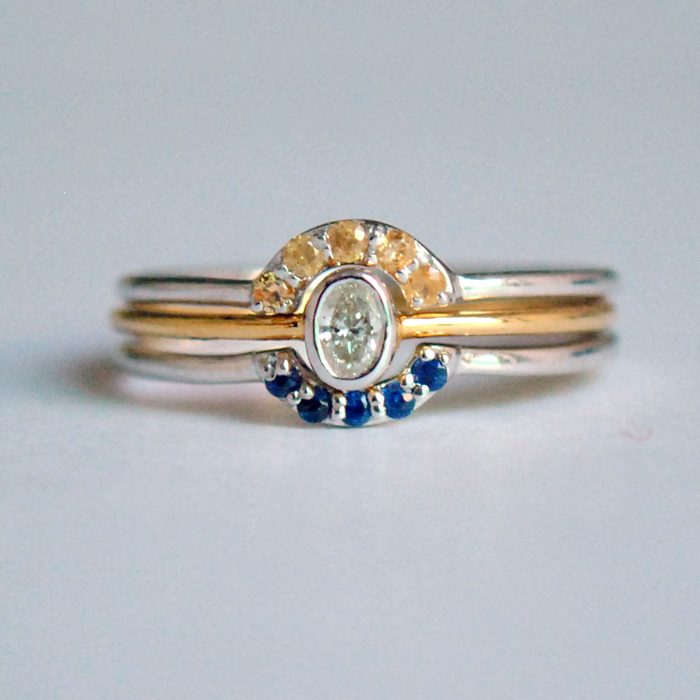 Oval Diamond Ring with Blue Sapphire and Garnet Stack Bands