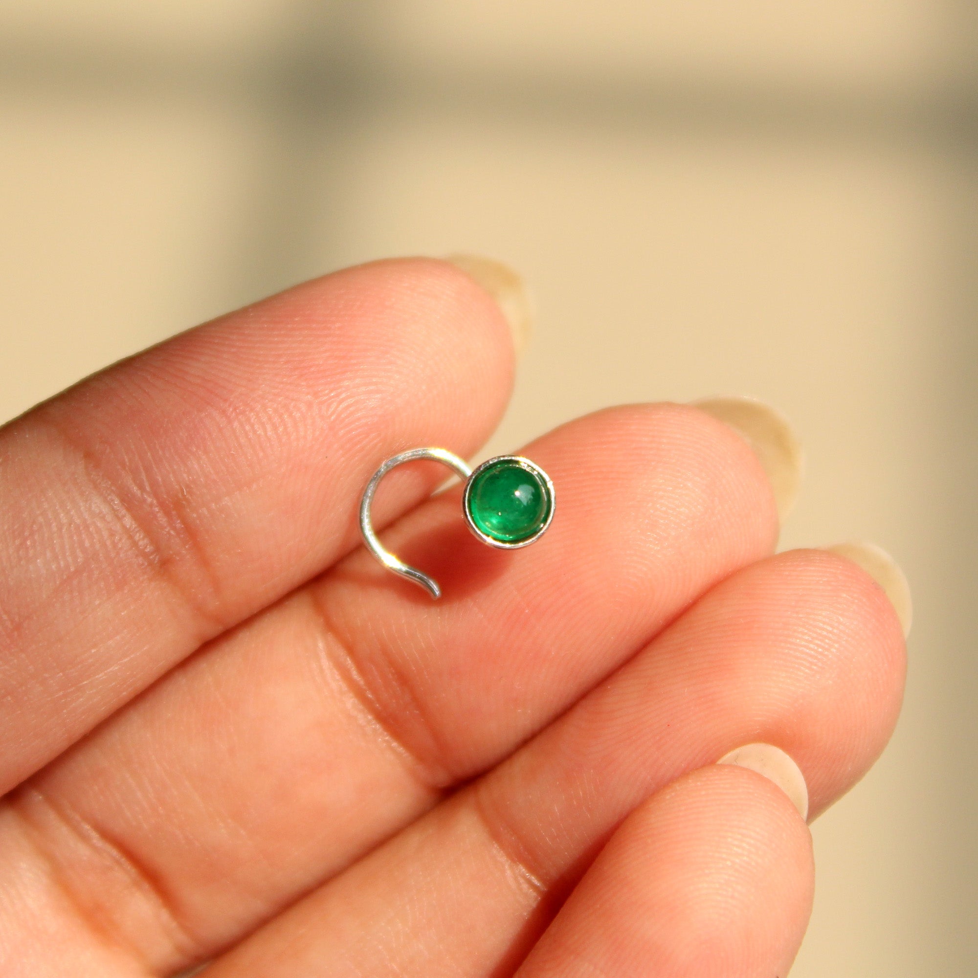 Green nose ring 2025