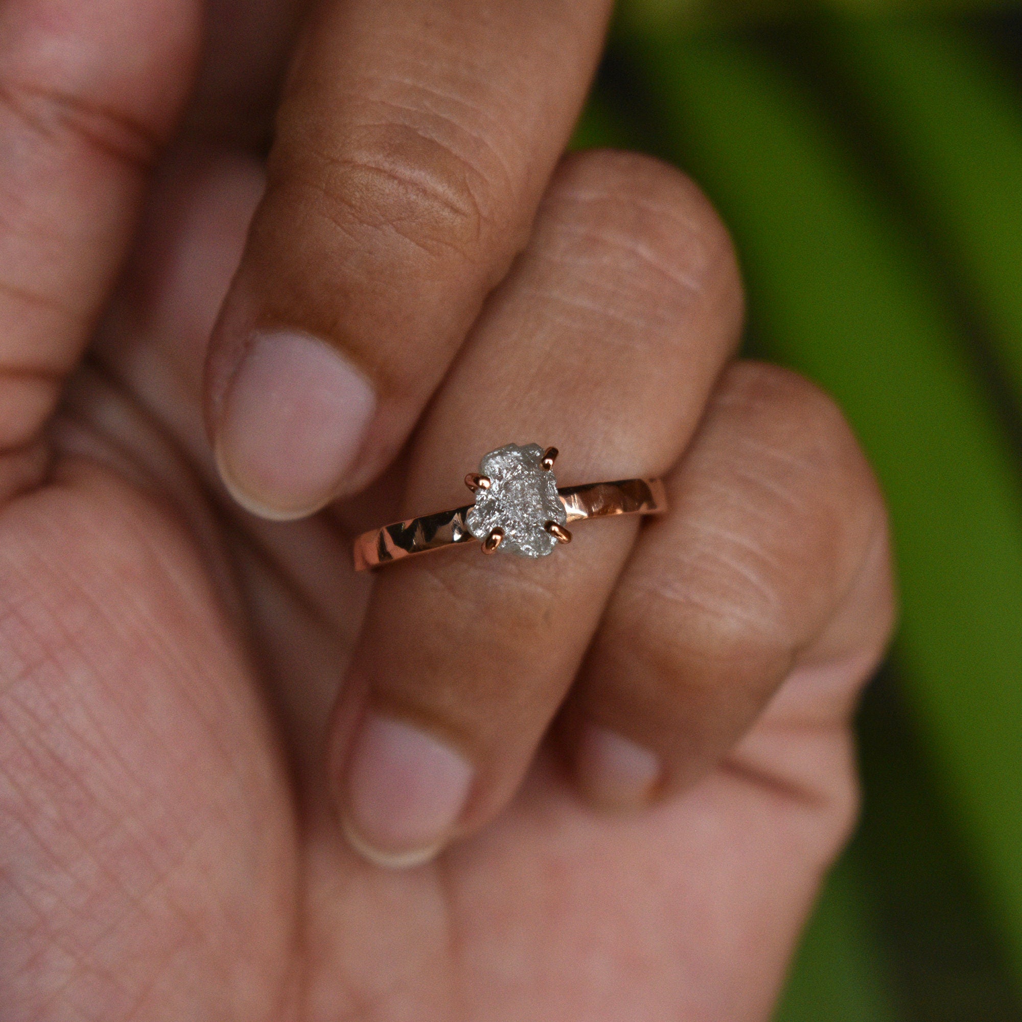 Round diamond claw set designer trilogy engagement ring