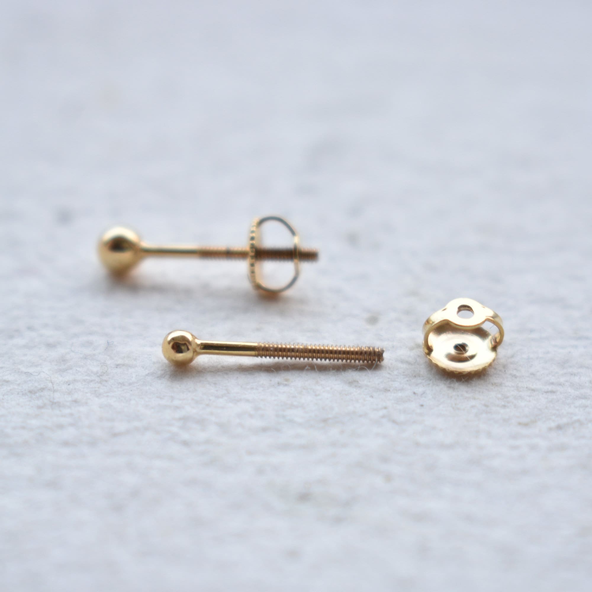 Golden Round Dumbbell Earrings Ear Piercing Studs for Men & Women